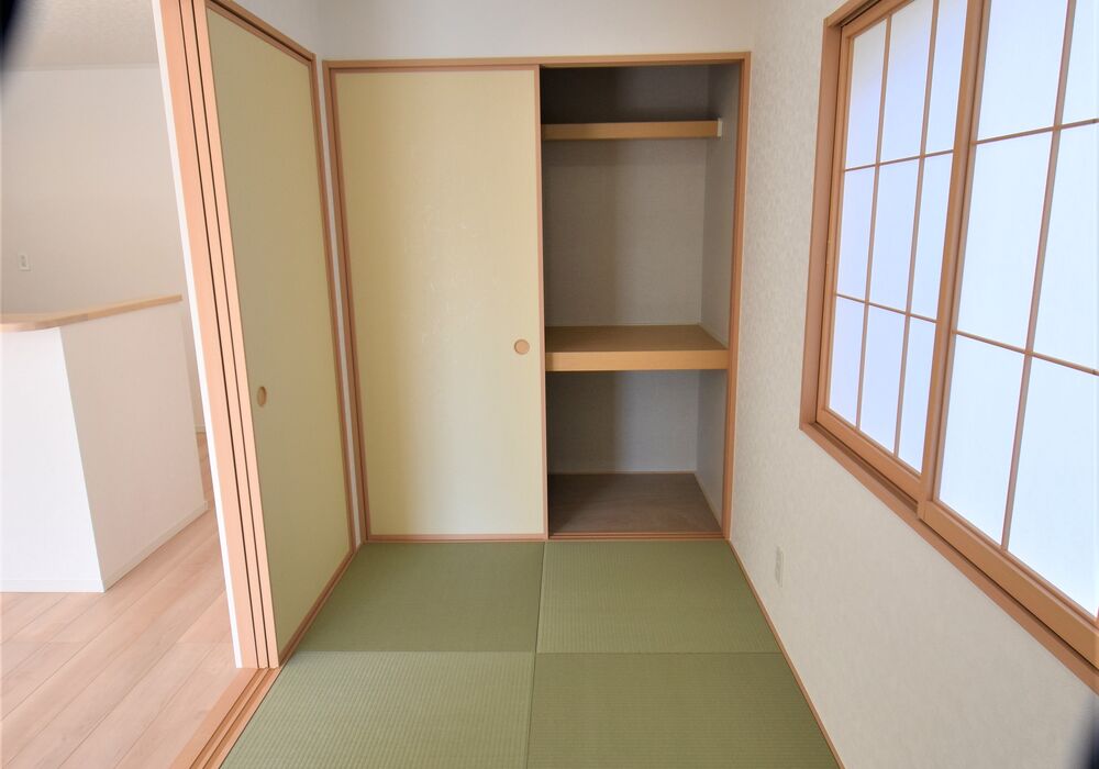 押入